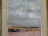 tableau représentant un paysage, dans un cadre doré, accroché à un mur de pierre