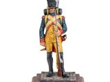 statue of a soldier in uniform with a sword on a wooden base
