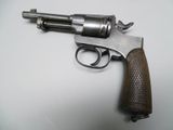 a picture of a gun that is on a table