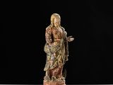 an image of a statue of a woman holding a child