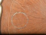 a wooden table with a clock on top of it
