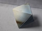 a close up of a metal object on a table