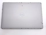 a laptop with a dell logo on it sitting on a table