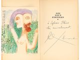 an old book with a drawing of a man with a beard