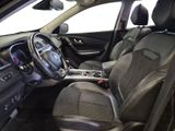 the interior of a car with black leather seats and a steering wheel