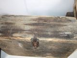 an old wooden box sitting on a table