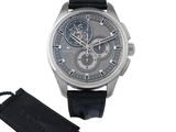 l'image d'une montre-bracelet avec un bracelet en cuir noir