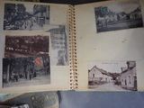 an open book with pictures of old buildings on it