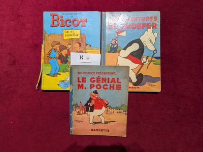 trois livres pour enfants sont posés sur une surface rouge