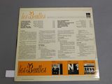 an image of a picture of the beatles album on a table