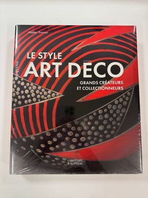 the cover of the book art deco is shown on a table