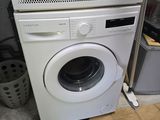 a washer and a dryer stacked on top of each other