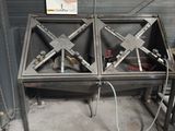 a large metal table with a lot of tools on it