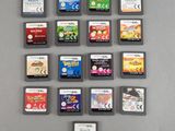 a lot of video game cards on the table