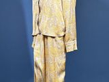an image of a mannequin dressed in a yellow suit