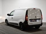 the back end of a white van parked in a white room