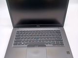 a laptop computer that is sitting on a table