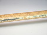 a close up of a piece of wood that has been stripped off