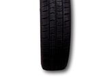 a close up of a tire on a white background