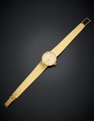 une montre-bracelet en or 18 carats