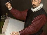 portrait of a man holding a pen and writing in a box
