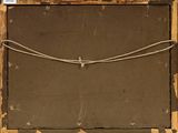 an old picture of a piece of cardboard with a rope attached to it