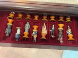 many figurines that are in a red box