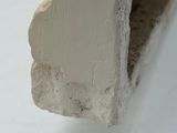a close up of a piece of wood sticking out of a wall