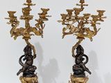 pair of antique bronze candlesticks with cherenshes and cherenshes