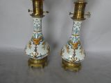 two lamps that are sitting on a table