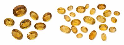 a group of yellow sapphires on a white background
