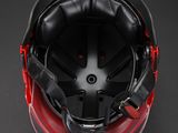 a close up of a helmet on a black background