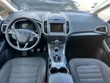 the interior of a car with a steering wheel and a dash board