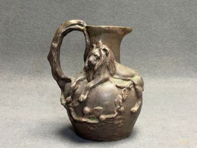 SAINT AMAND - GFC attribué à Pichet en grès à décor de lion,…