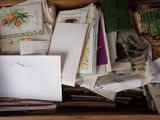 a wooden box filled with lots of cards and envelopes