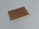 a brown book sitting on top of a table