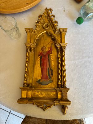 a picture of a table with a plate of food and a bottle of water