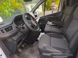 the interior of a van with black leather seats and a steering wheel