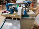 a machine that is sitting on a table in a garage