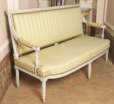 a couch that is sitting in the corner of a room