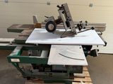 a machine that is sitting on a pallet in a garage