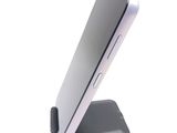 a close up of a cell phone on a stand
