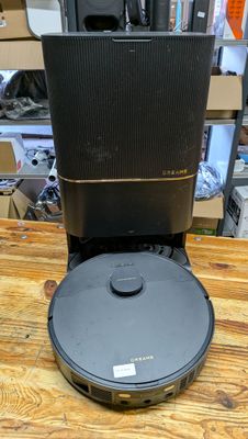 an image of a coffee maker sitting on top of a wooden table