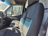 a view of the inside of a vehicle with the driver ' s seat up