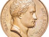 an image of a gold coin with a profile of a man