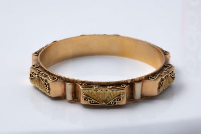 an image of a close up of a ring on a white surface