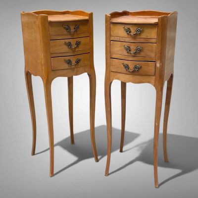 pair of louis xv style bedside tables