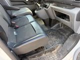 a picture of the inside of a car with the seats down