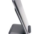 a cell phone that is sitting on top of a stand