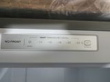 a close up of a label on the bottom of a dishwasher